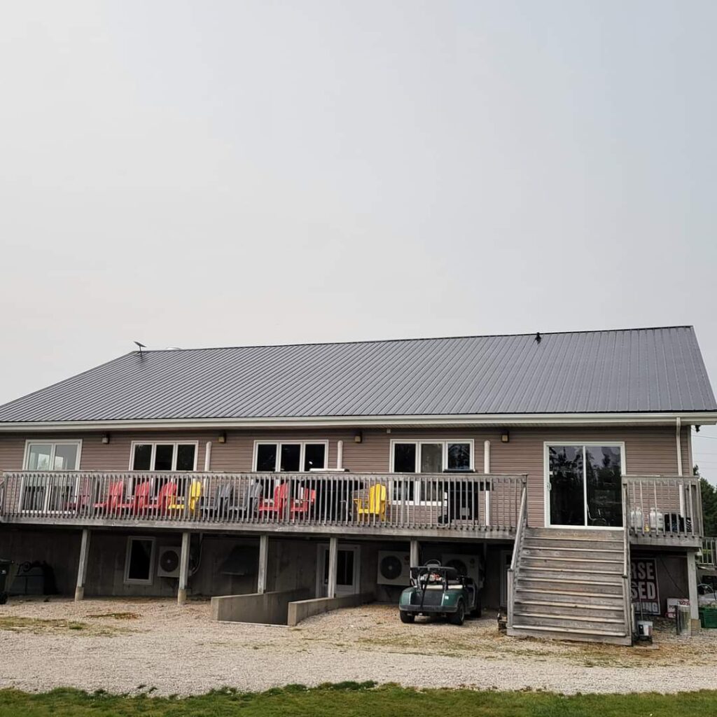 A picture showcasing a roof job done on a house.