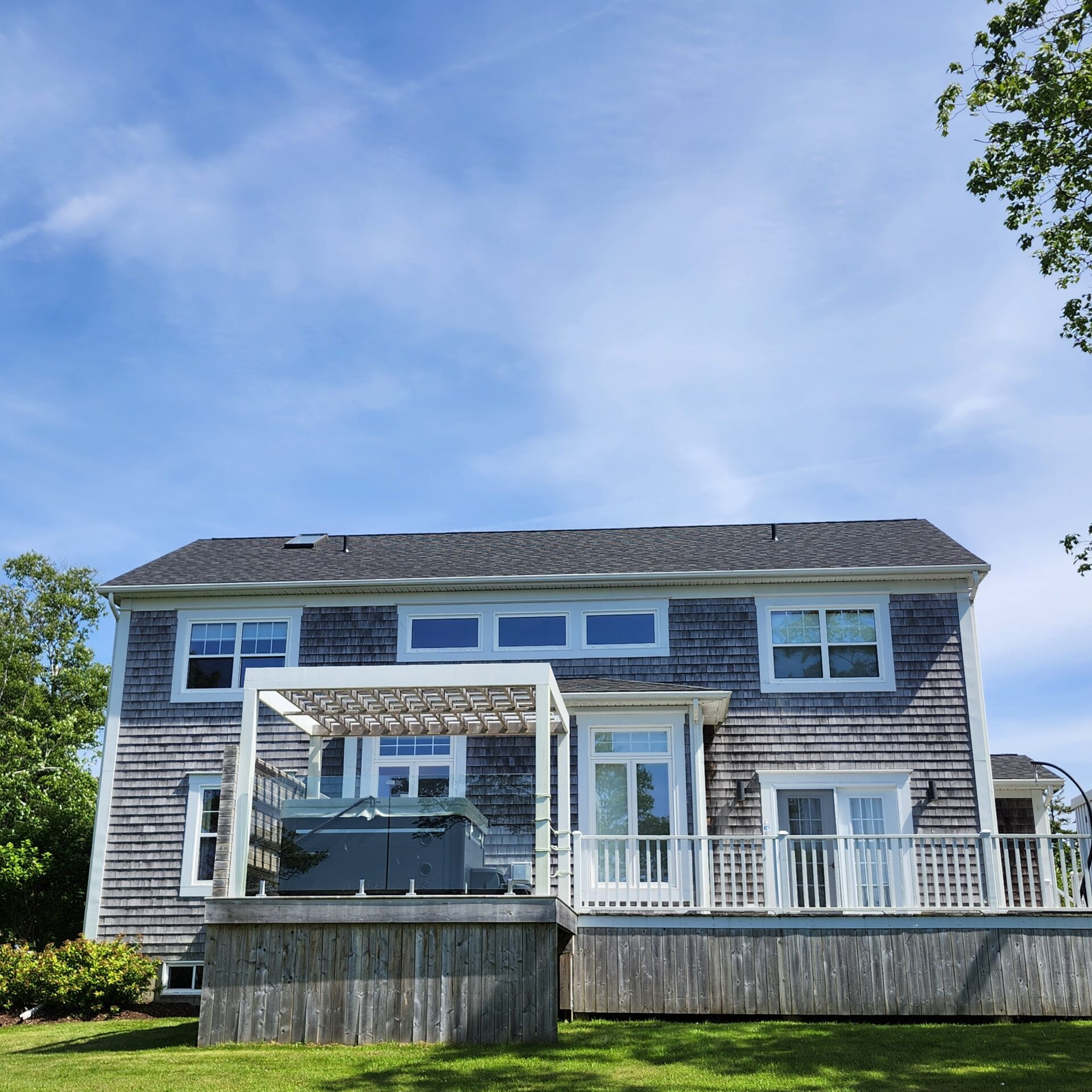 A picture showcasing a roof job done on a house.